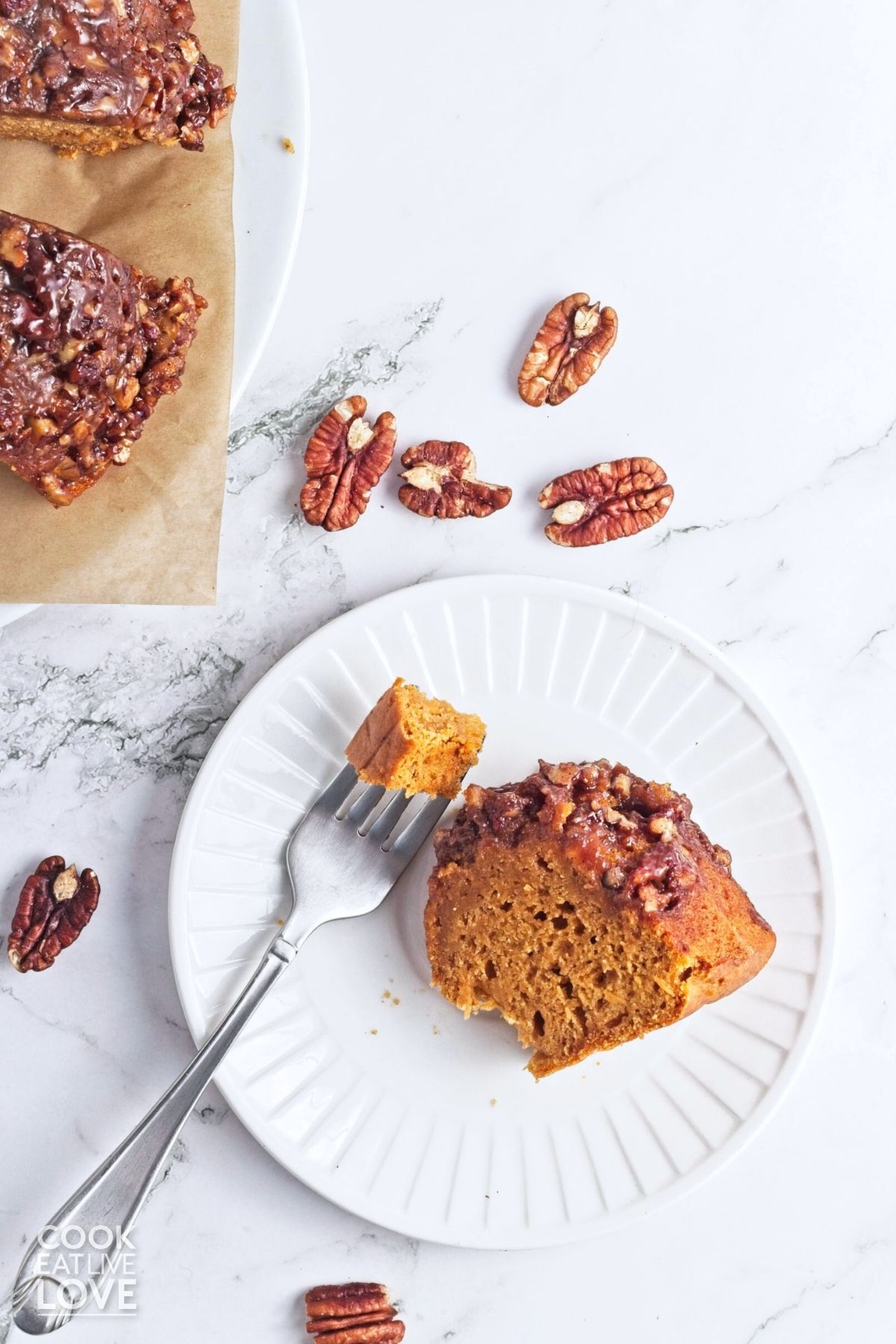 A slice of sweet potato cake on a white plate. 