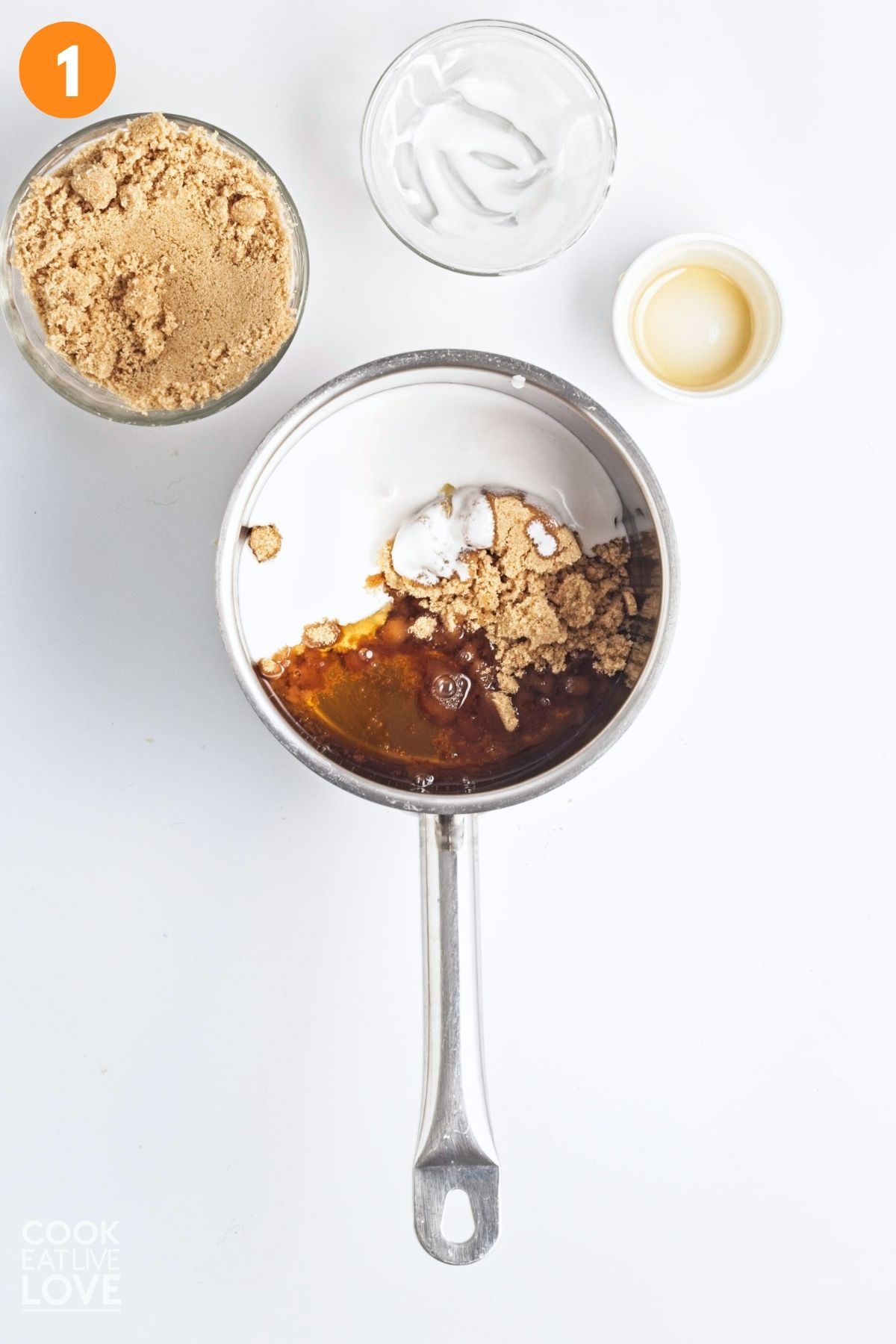 Ingredients to make the caramel sauce in a saucepan. 