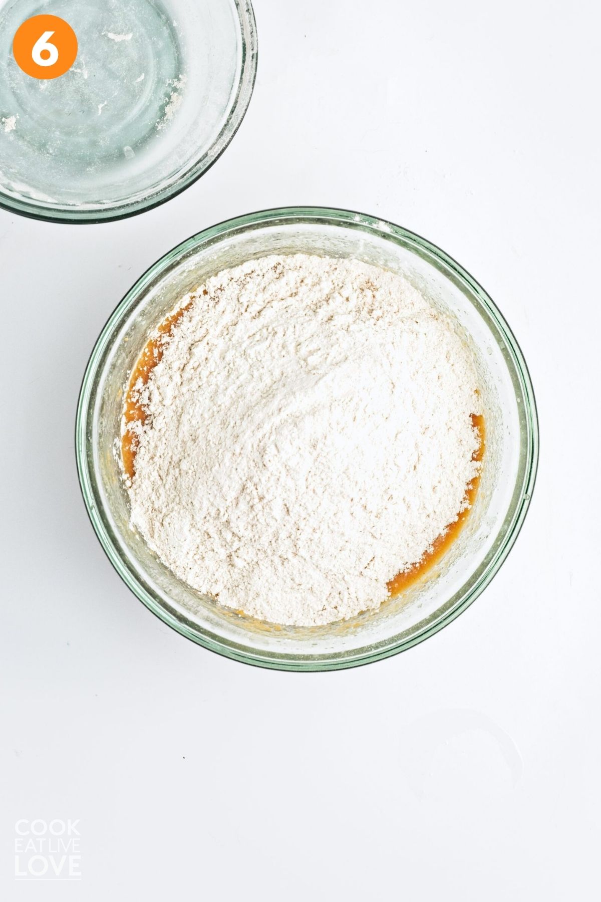 Dry ingredients added to the bowl of mixed wet ingredients. 