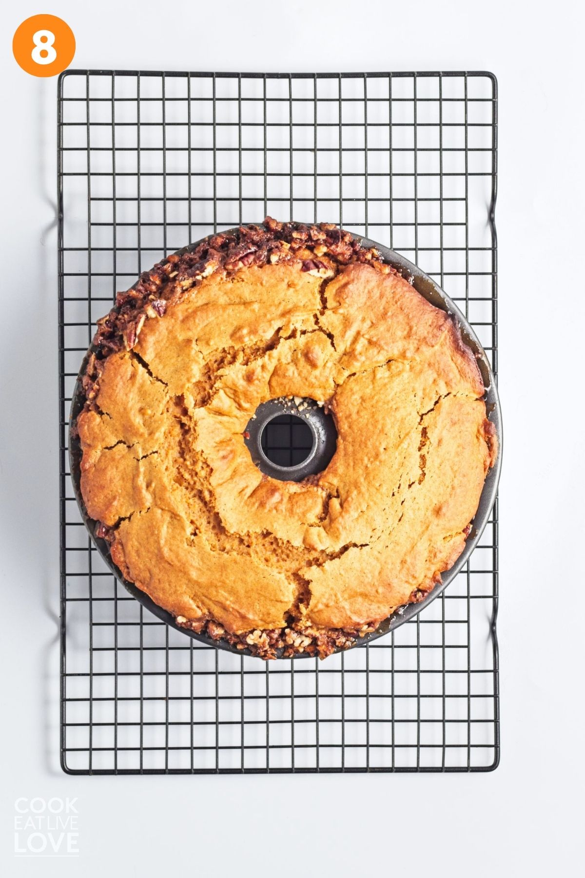 Sweet potato bundt cake cooling on a wire rack. 