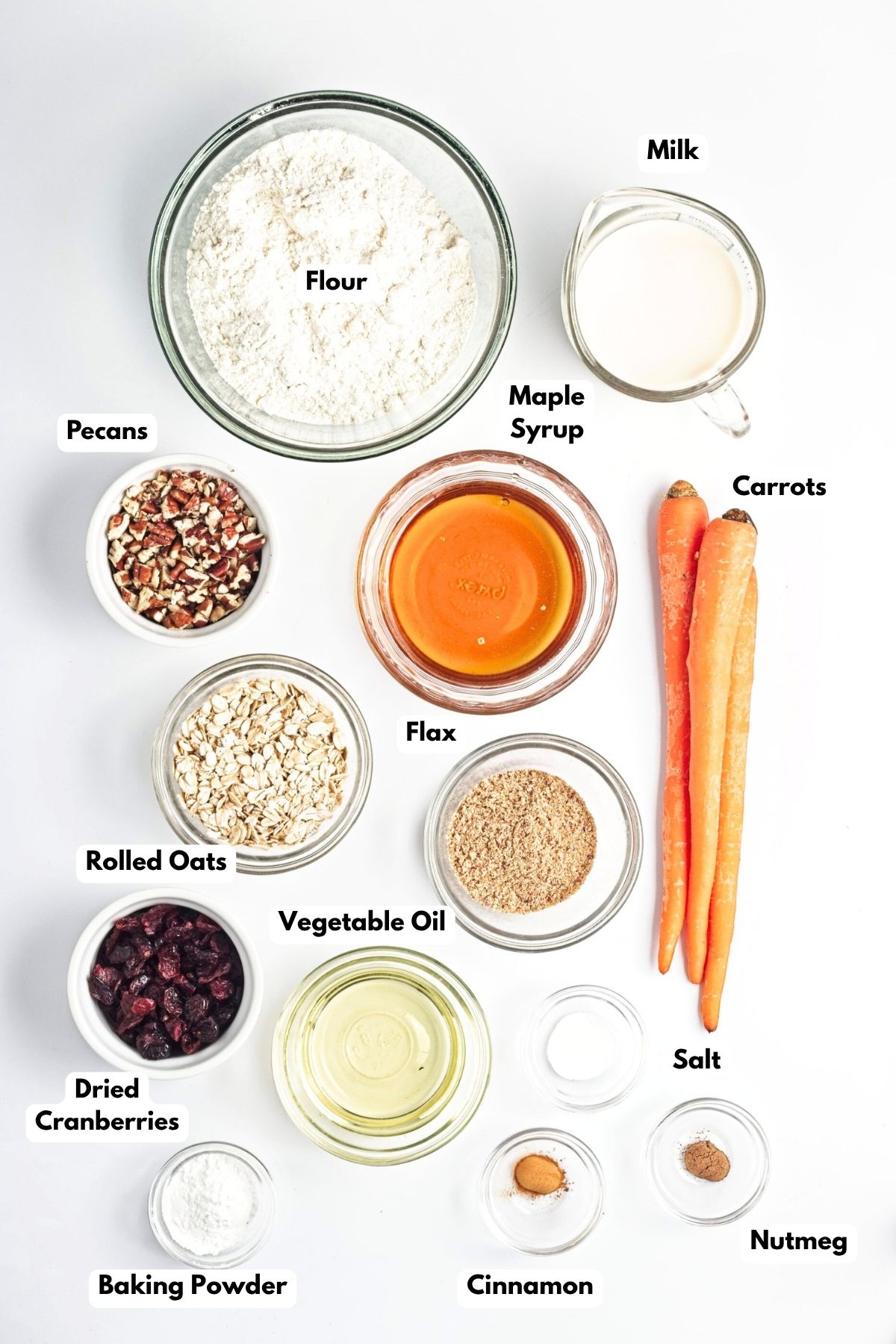 Ingredients to make carrot cake muffins on the table. 