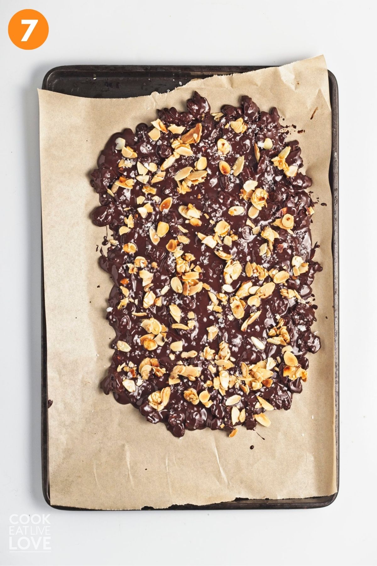 Almonds sprinkled on top of the chocolate. 