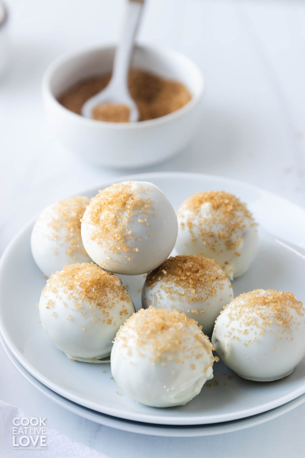Gingerbread truffles stacked on a plate.