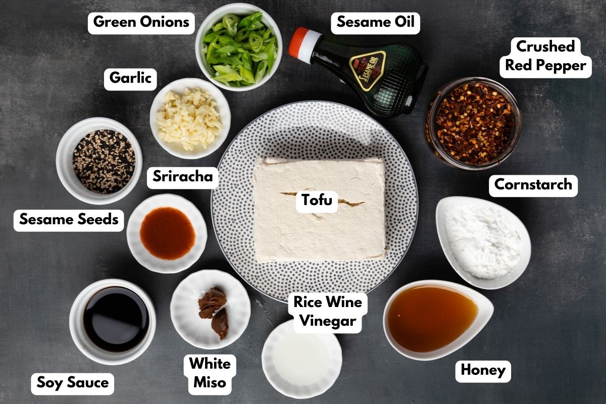Ingredients to make this honey garlic soy tofu dish on a table.