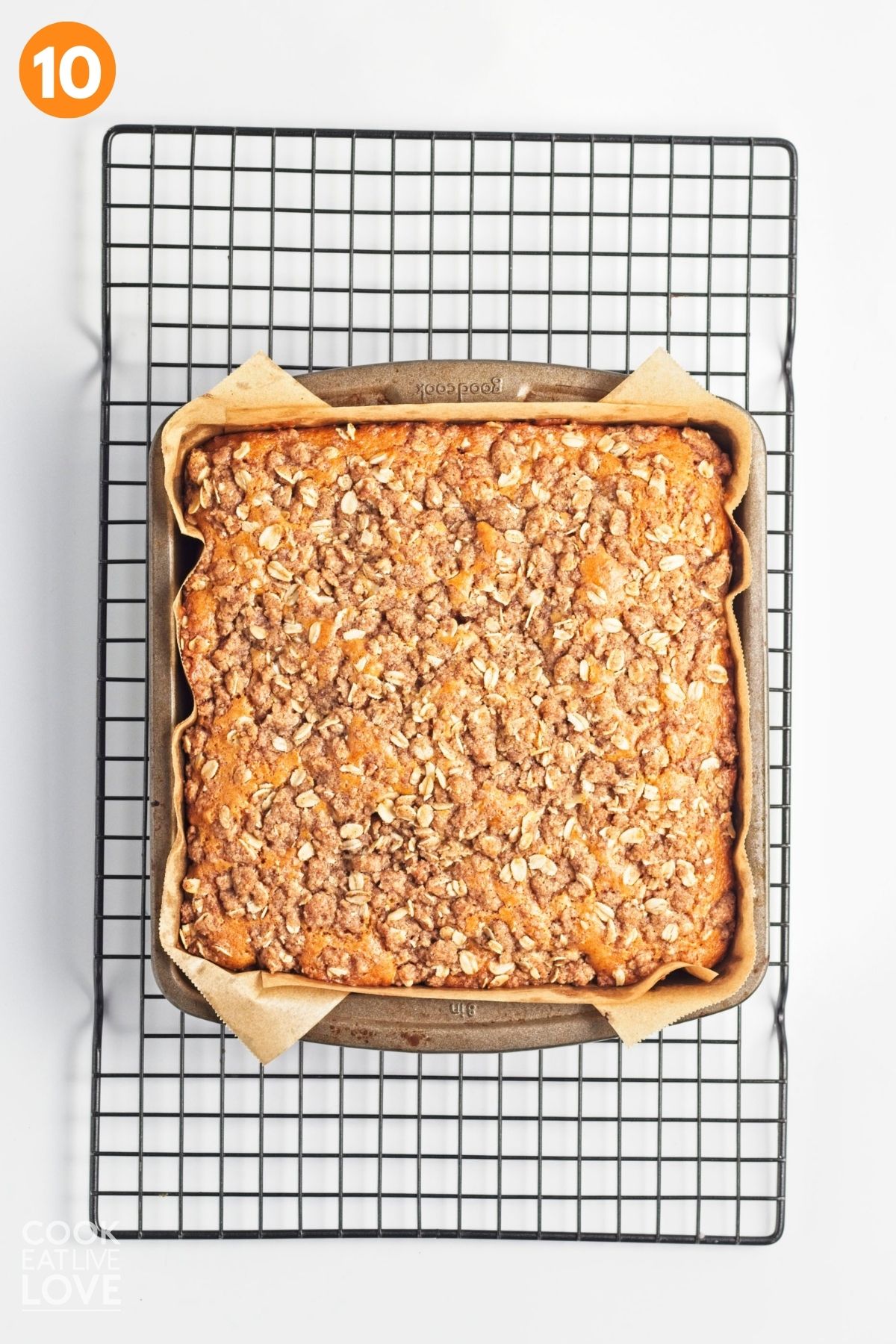 The vegan coffee cake baked and cooling on a wire rack. 