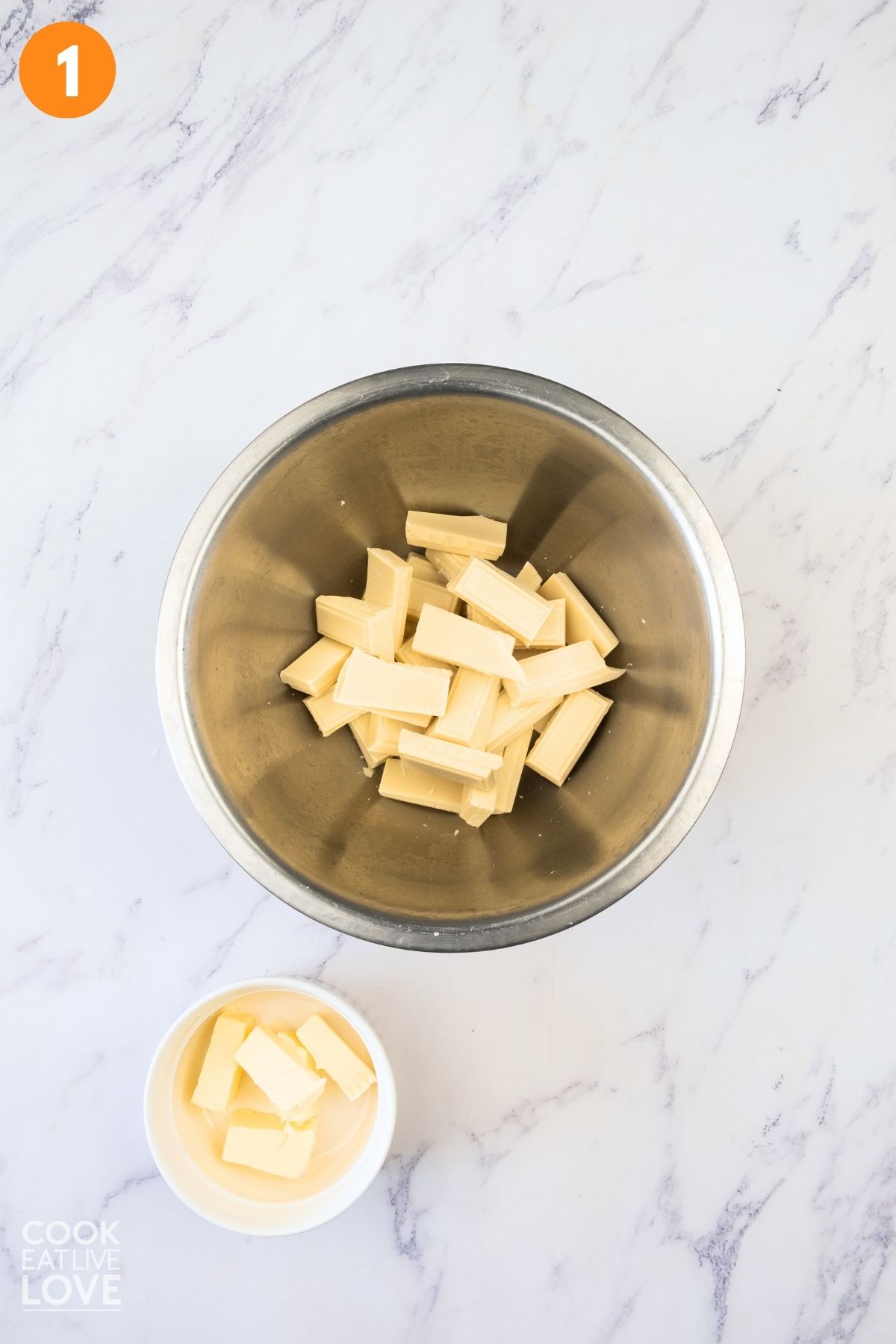 White chocolate and butter to melt in the bowl.