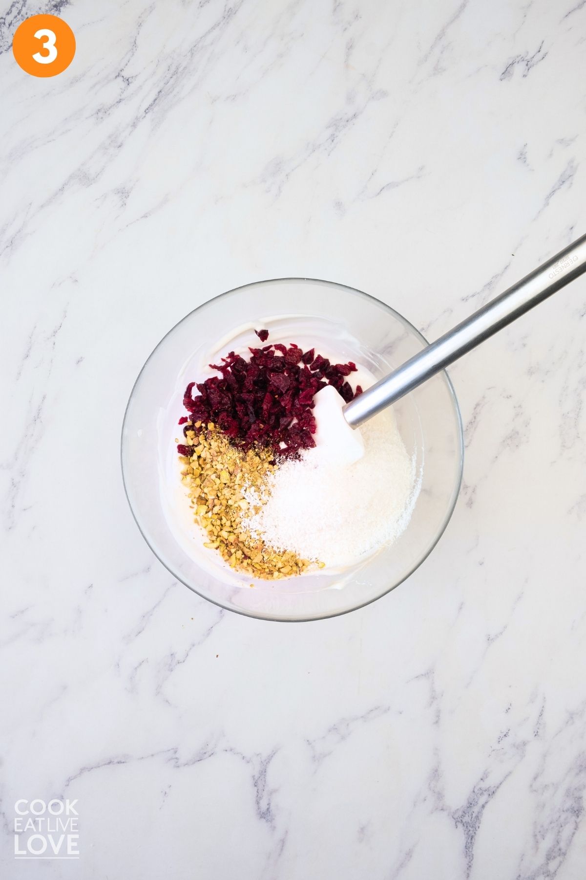 Pistachios and the chopped cranberries mixed into the sour cream mixture.