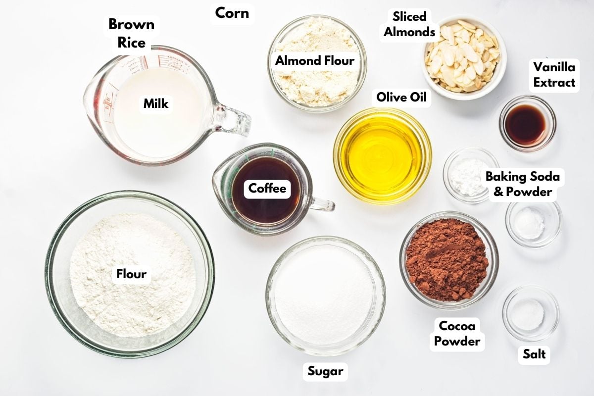 Ingredients to make this cake in bowls on a table.