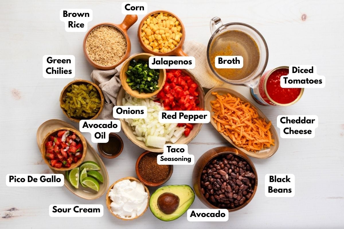 Ingredients to make this rice in bowls on a table.