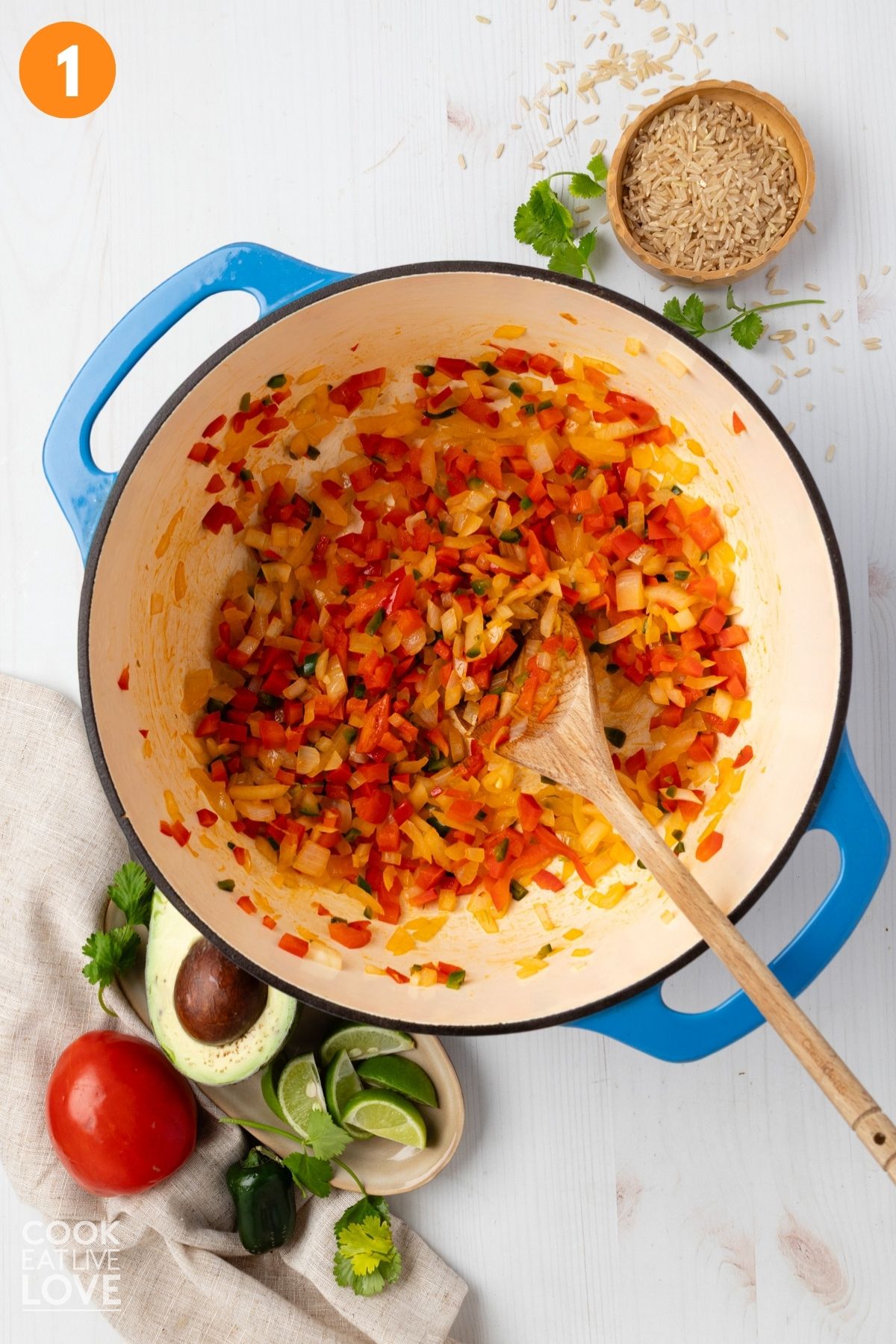 Onion, bell pepper, and jalapeno in a skillet.