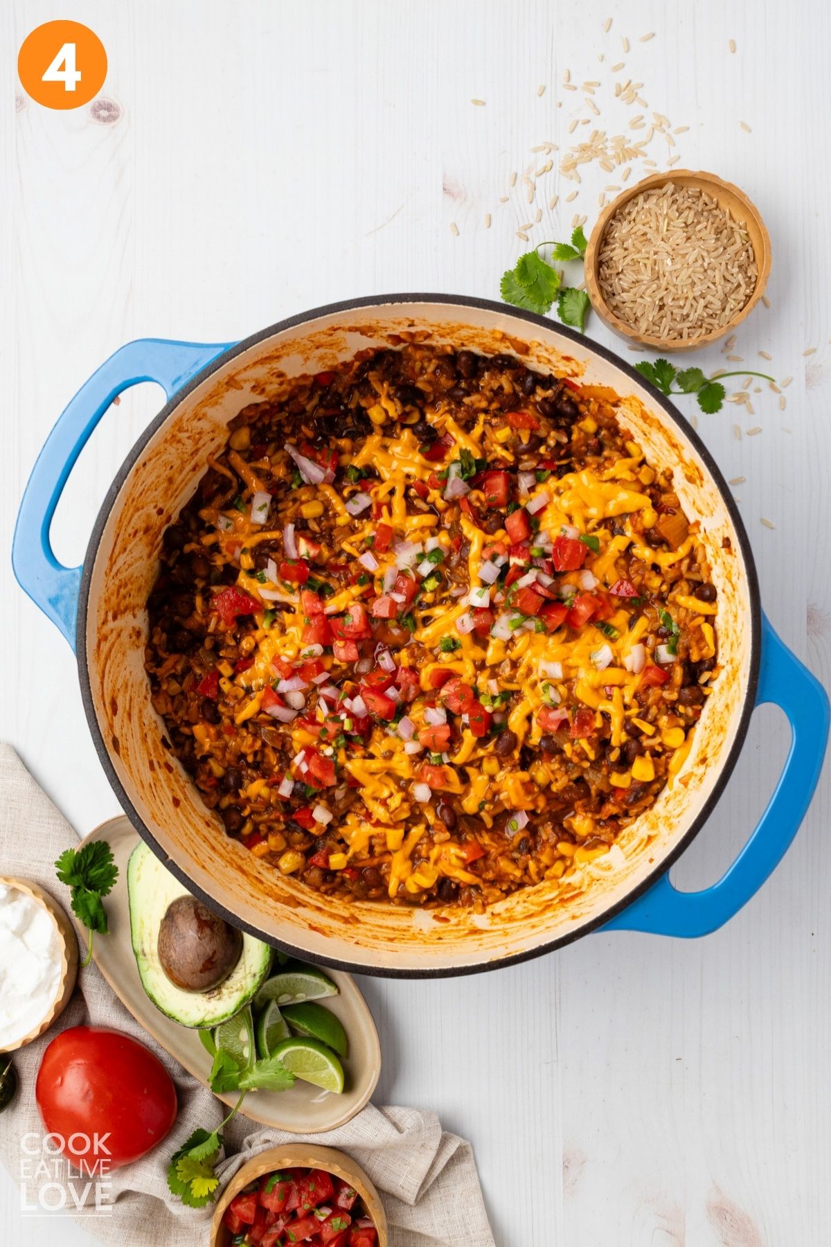 Cooked rice finished and cheese added over top.