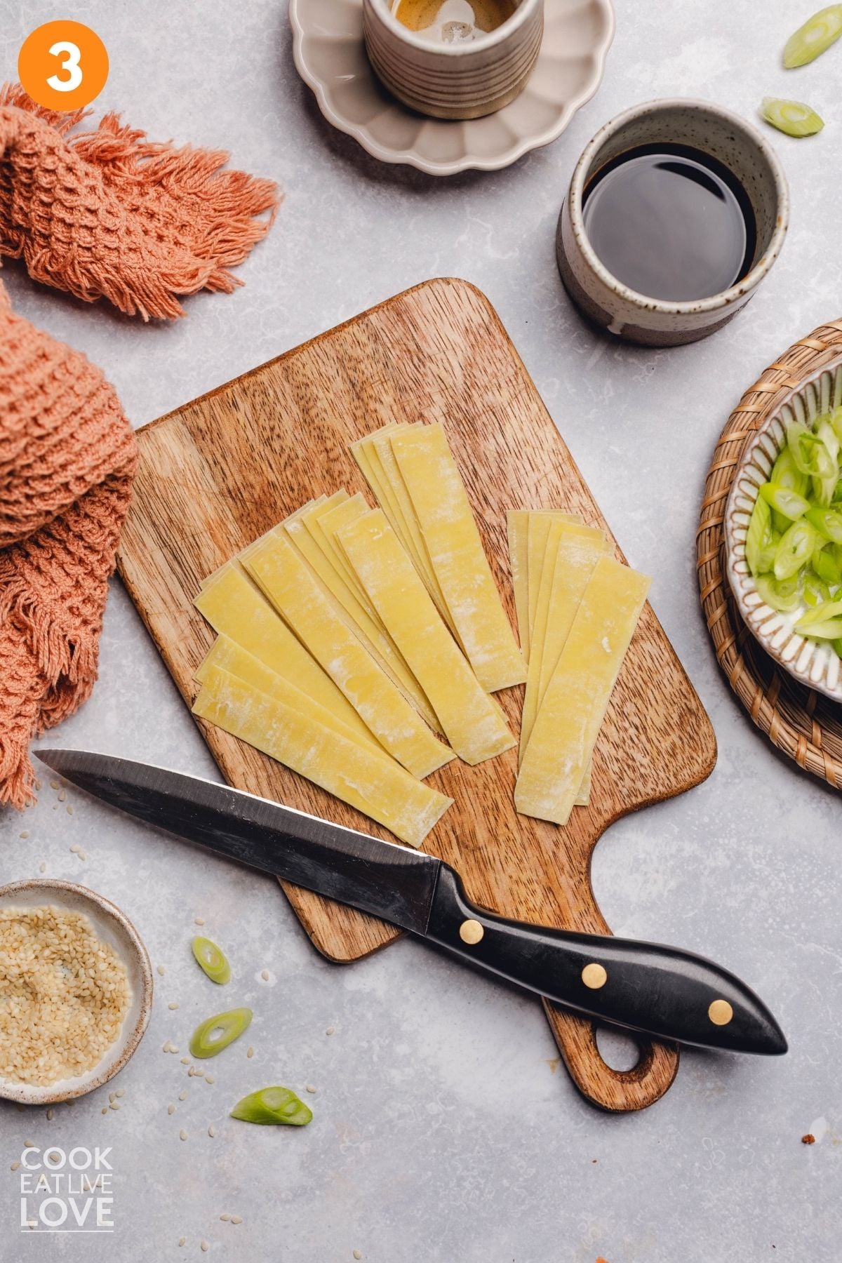 Wonton wrappers sliced into strips.