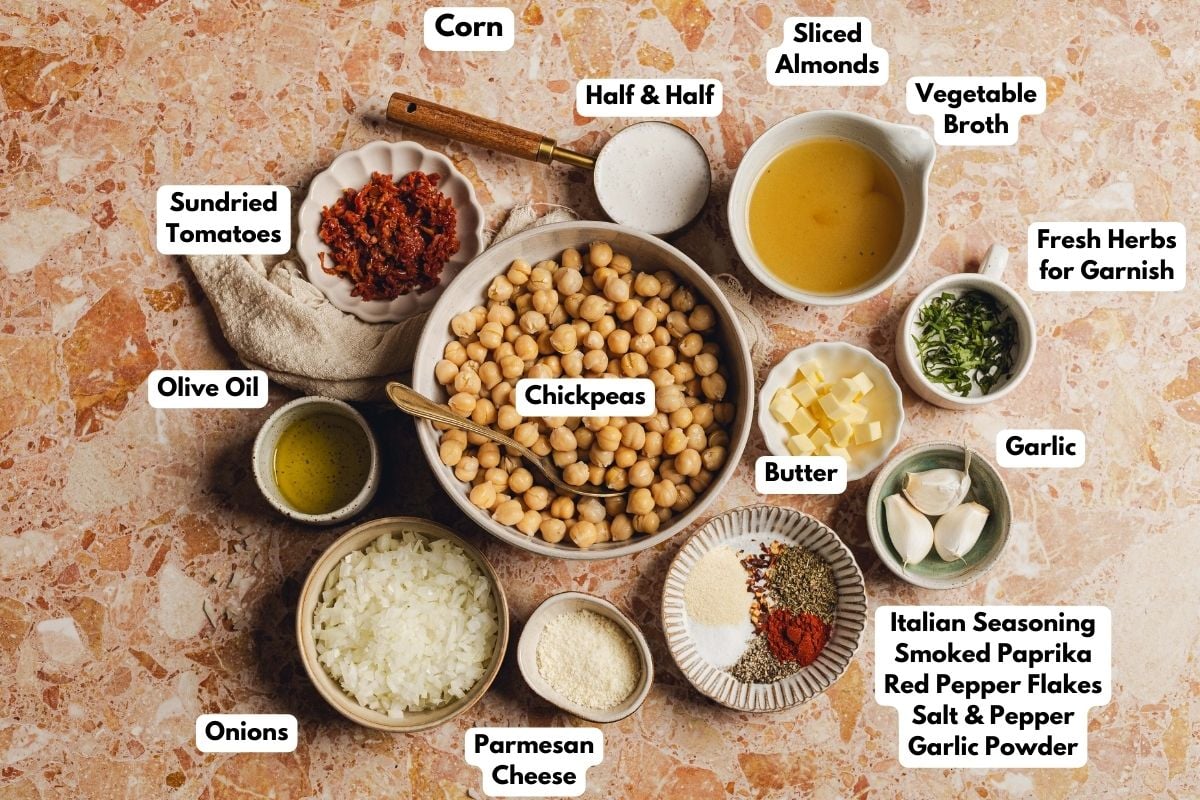 Ingredients to make these Tuscan chickpeas in bowls on a table.