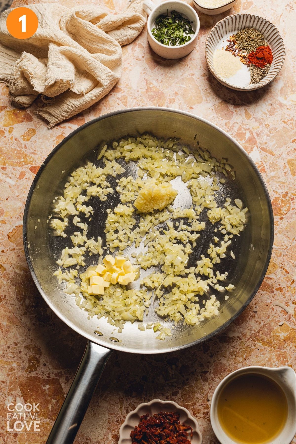 Onions sauteeing in a skillet