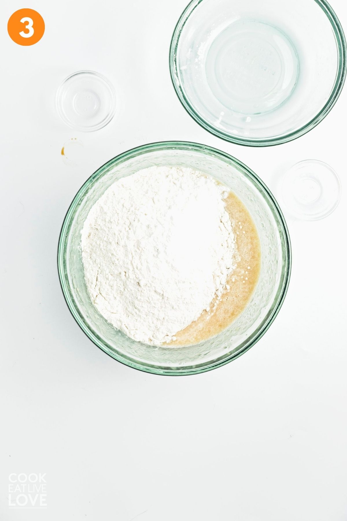 Flour, baking powder, and salt added to the banana mixture.