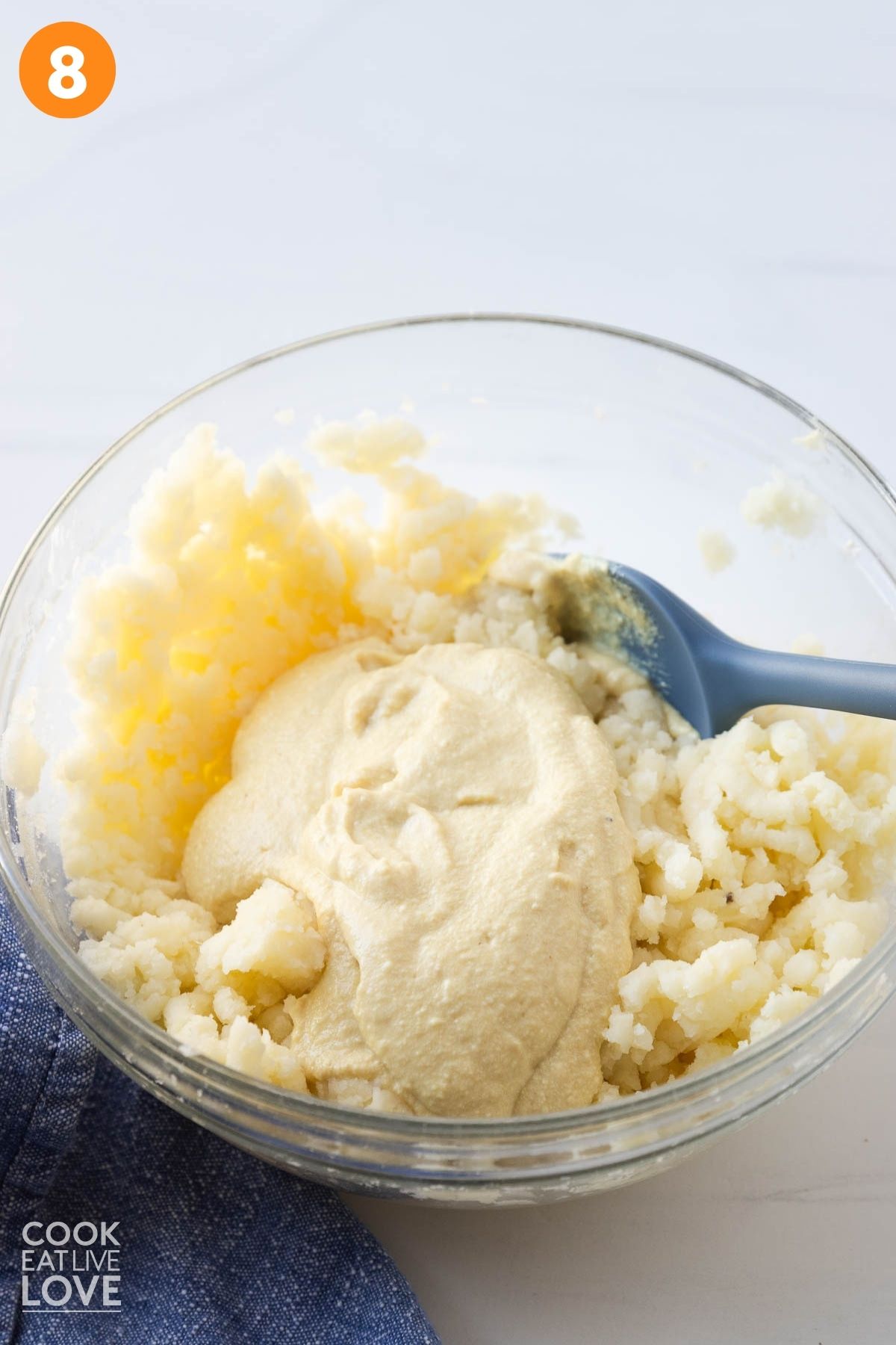 Tofu mixture added to the potatoes. 