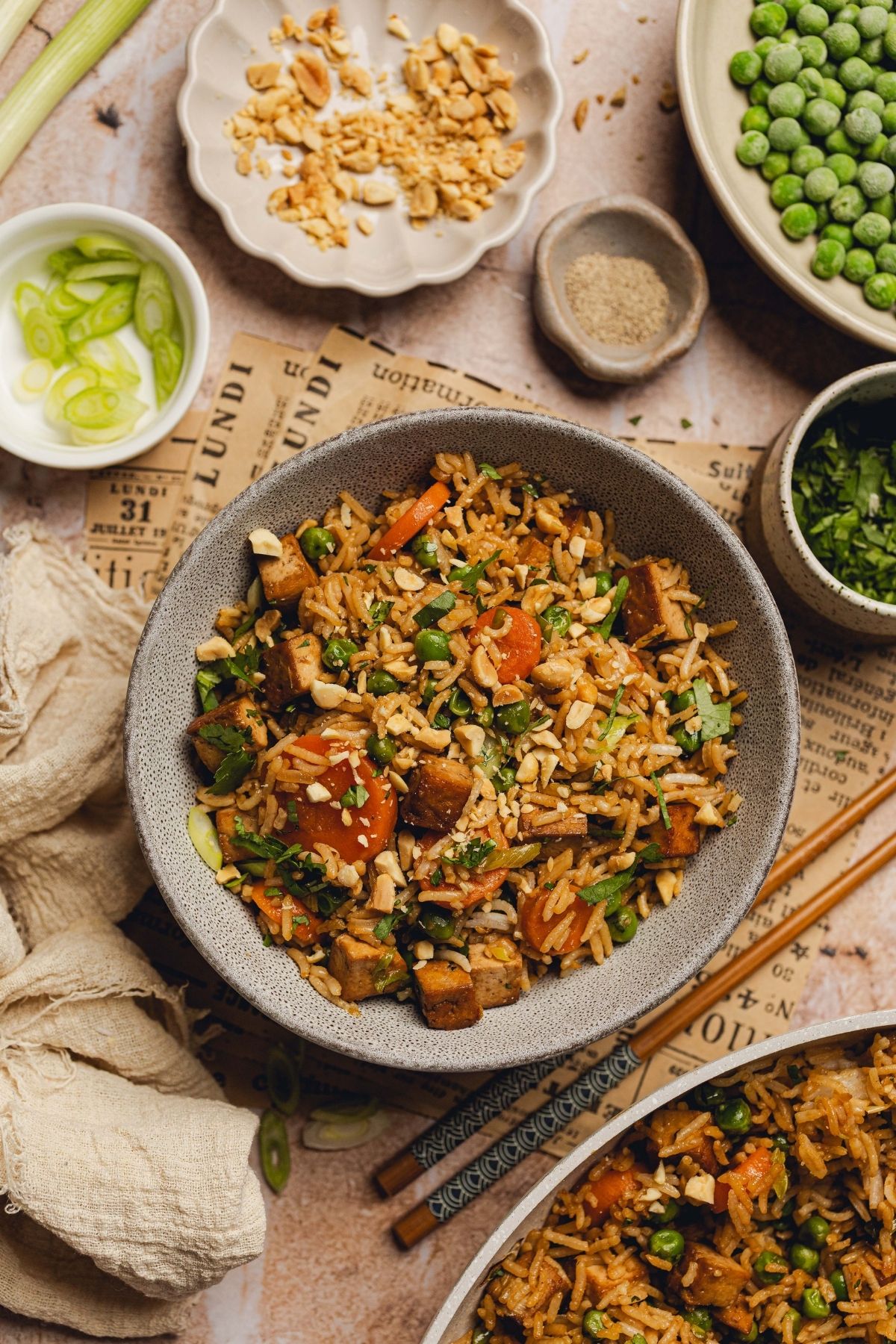 Tofu fried rice in a gray bowl.