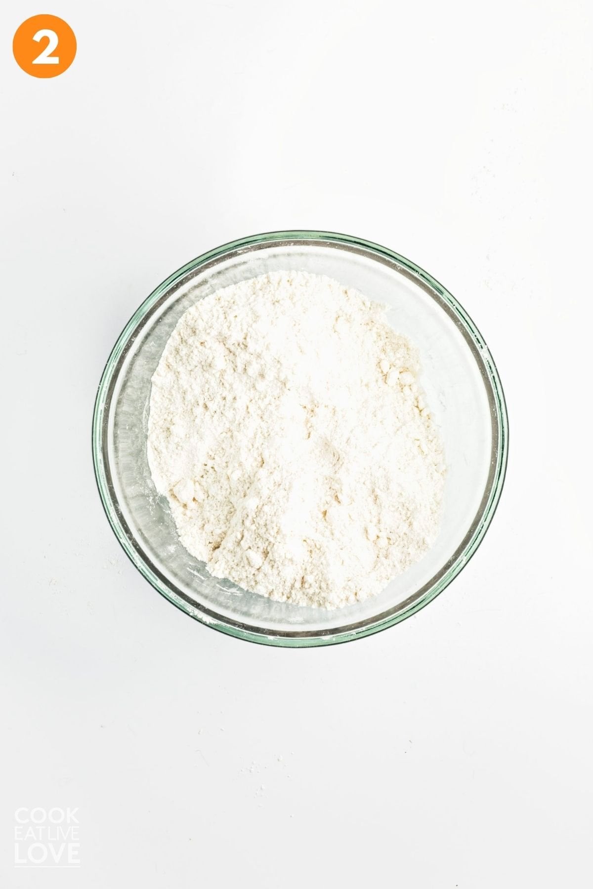 Dry ingredients added to a bowl.