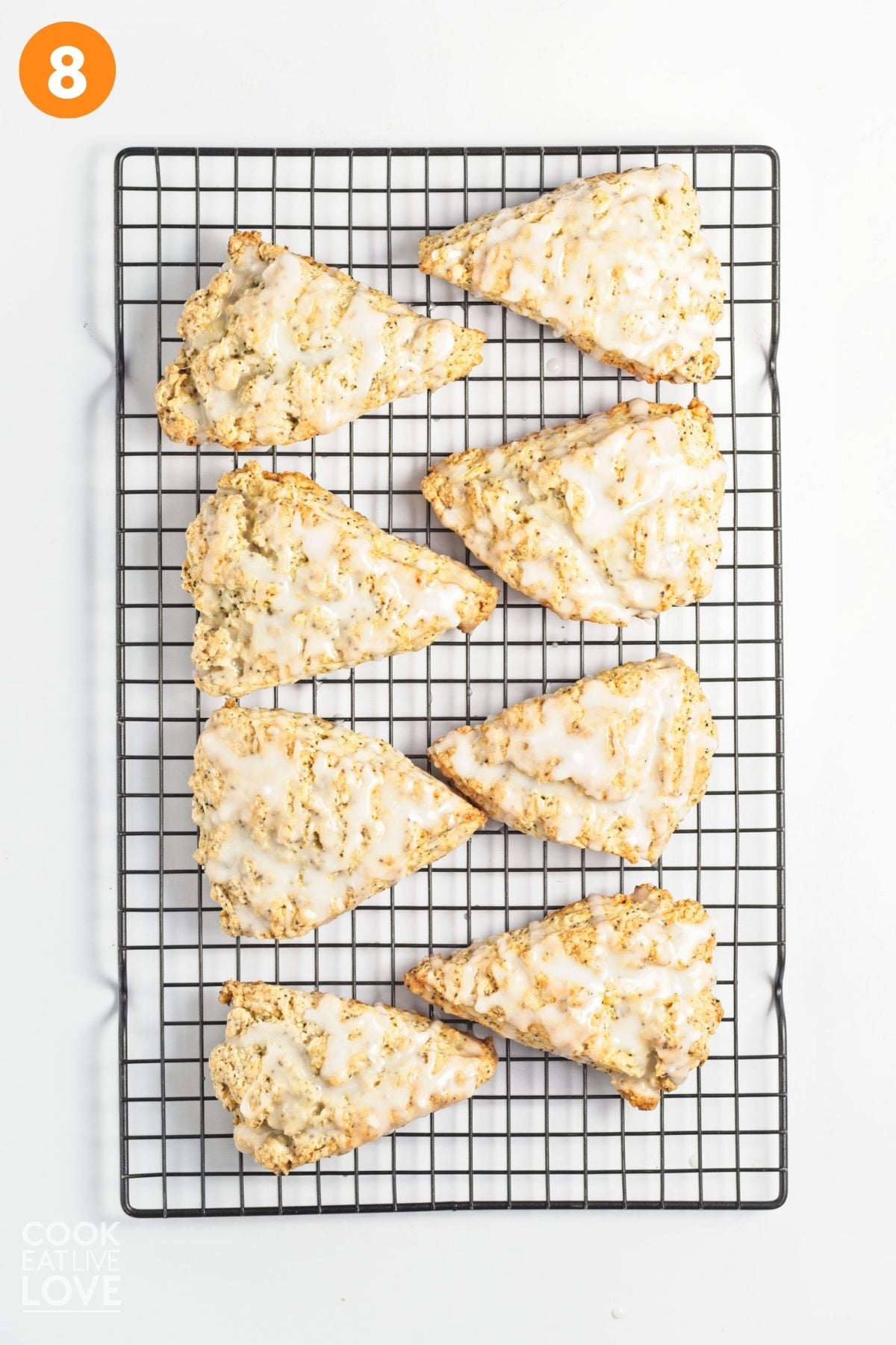 The baked lemon scones cooled and glaze poured on top.