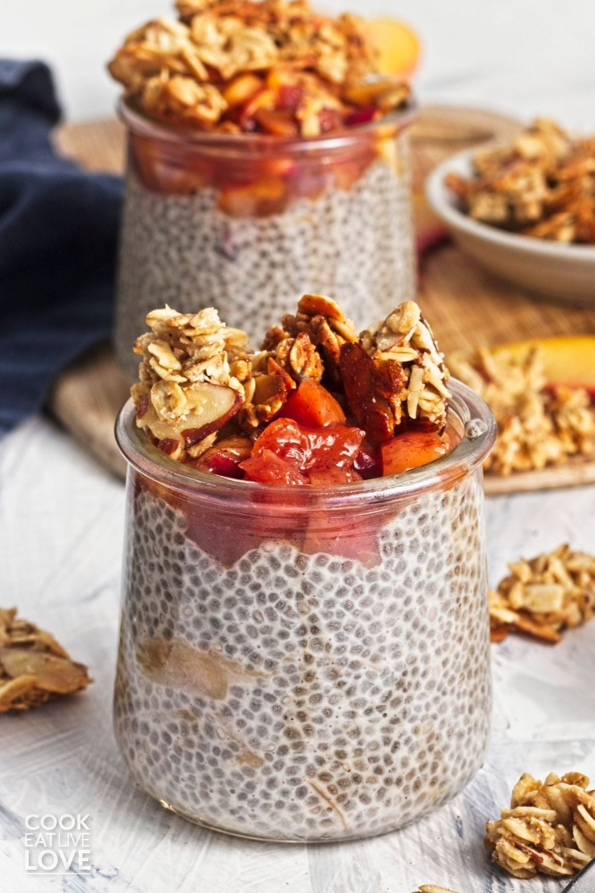 Peach chia pudding with granola on top.