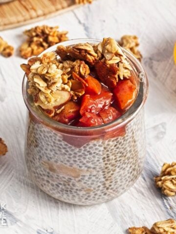 Peach mixture and granola added to the top of the pudding.