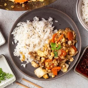 Tofu cabbage stir fry on a plate.