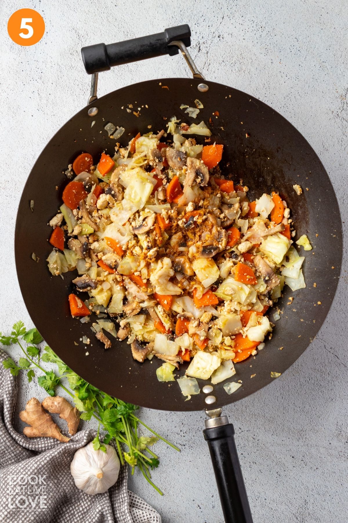 Soy sauce added to the stir fry.