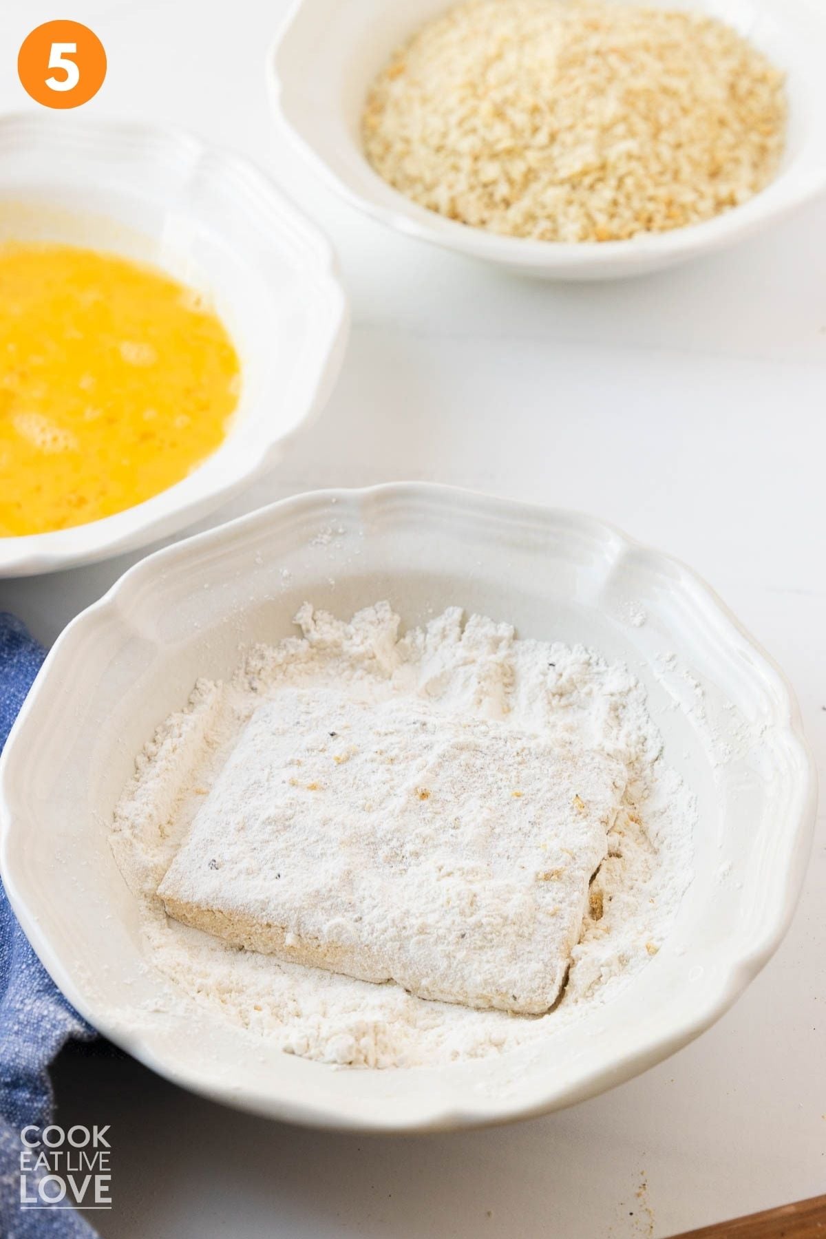 Tofu coated in flour.