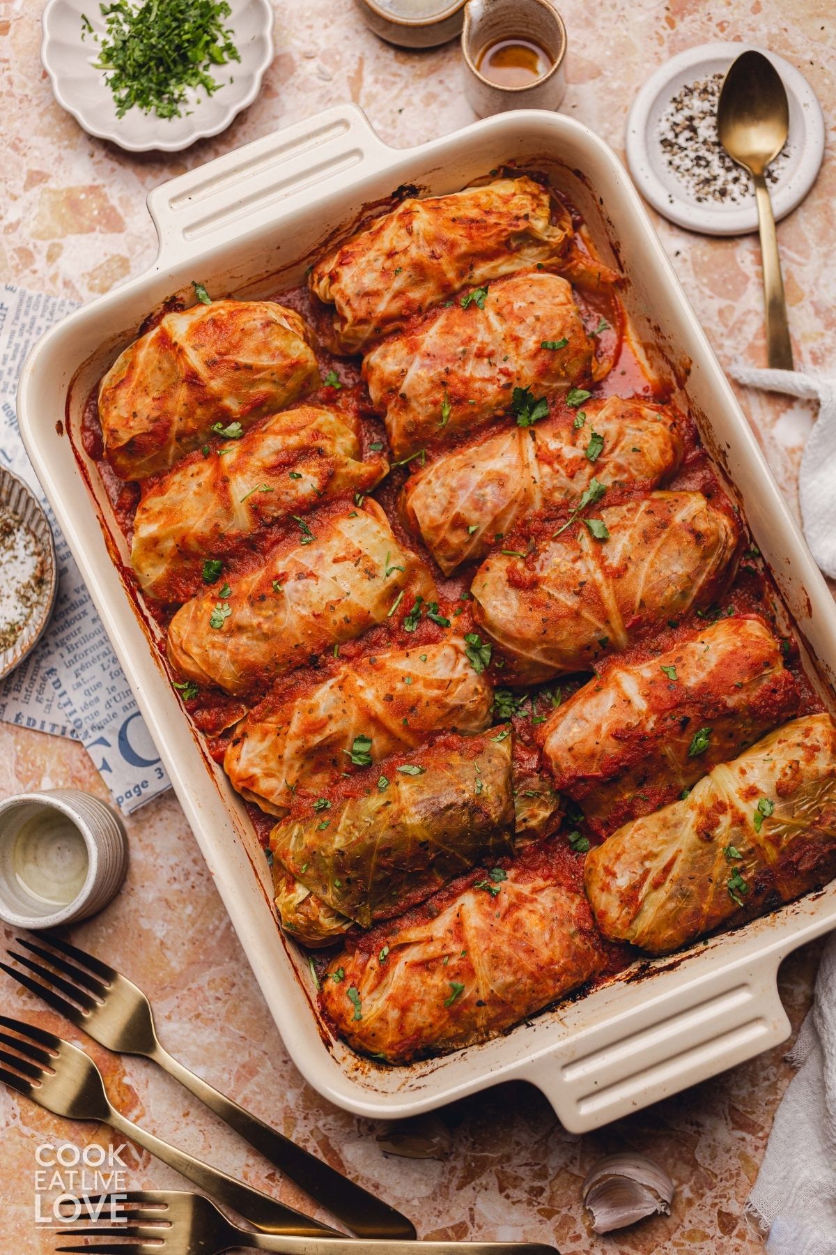 Vegetarian cabbage rolls in a casserole dish.