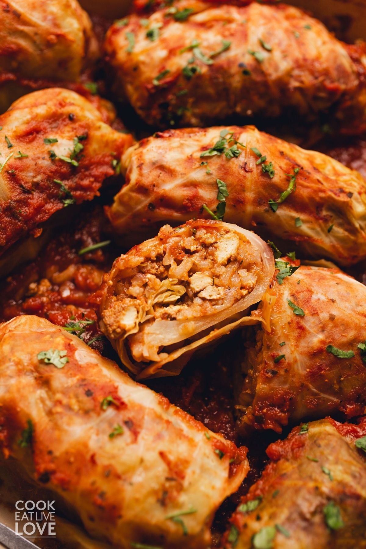 A cabbage roll cut open in the center.