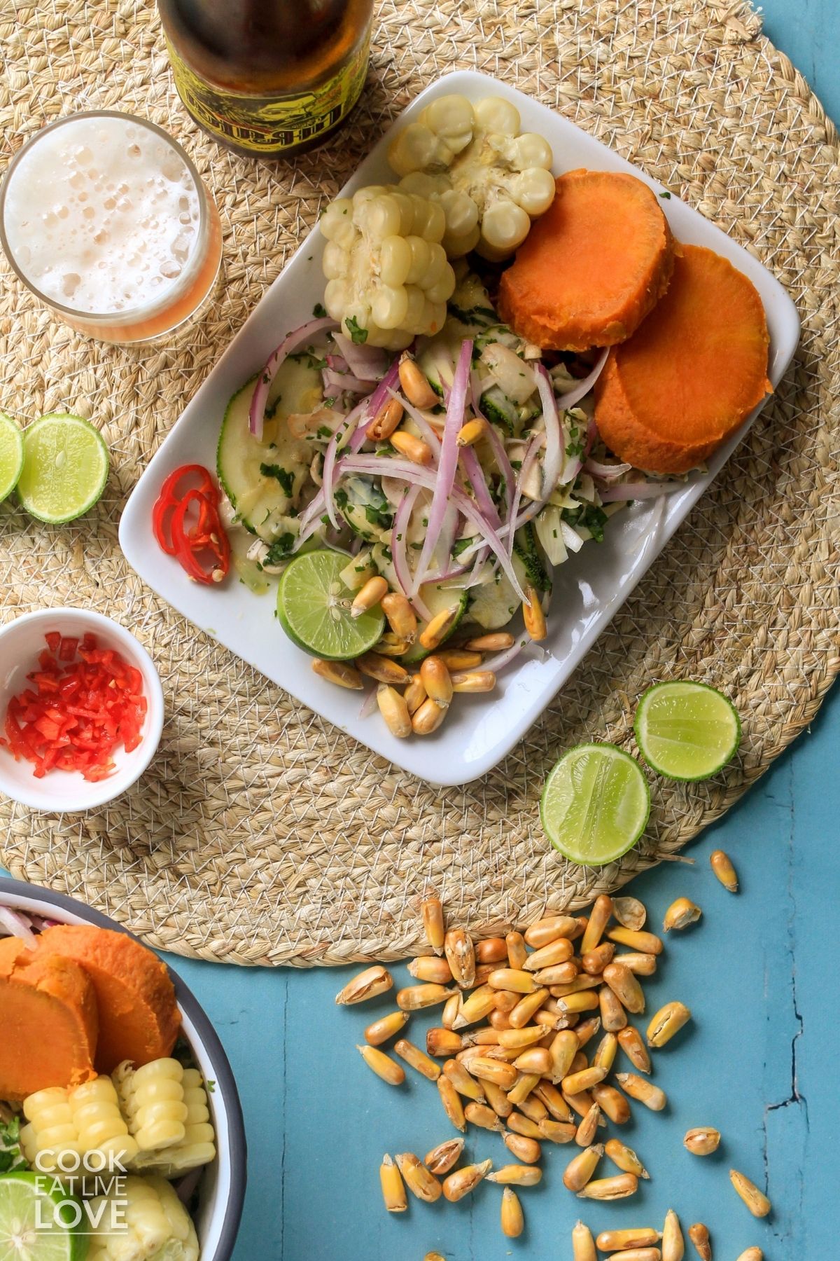 Vegan Peruvian ceviche on a plate with sweet potatoes and corn.
