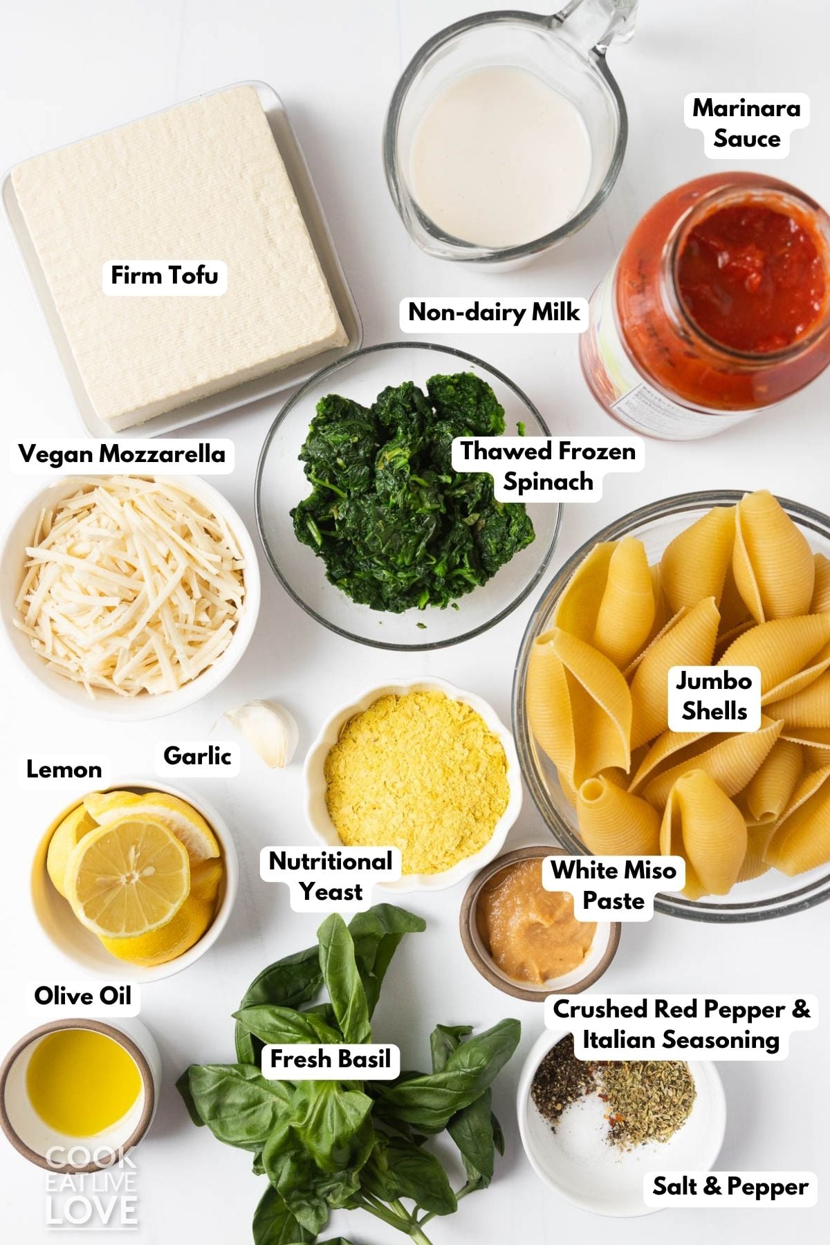Ingredients to make vegan shells with tofu ricotta on a table.