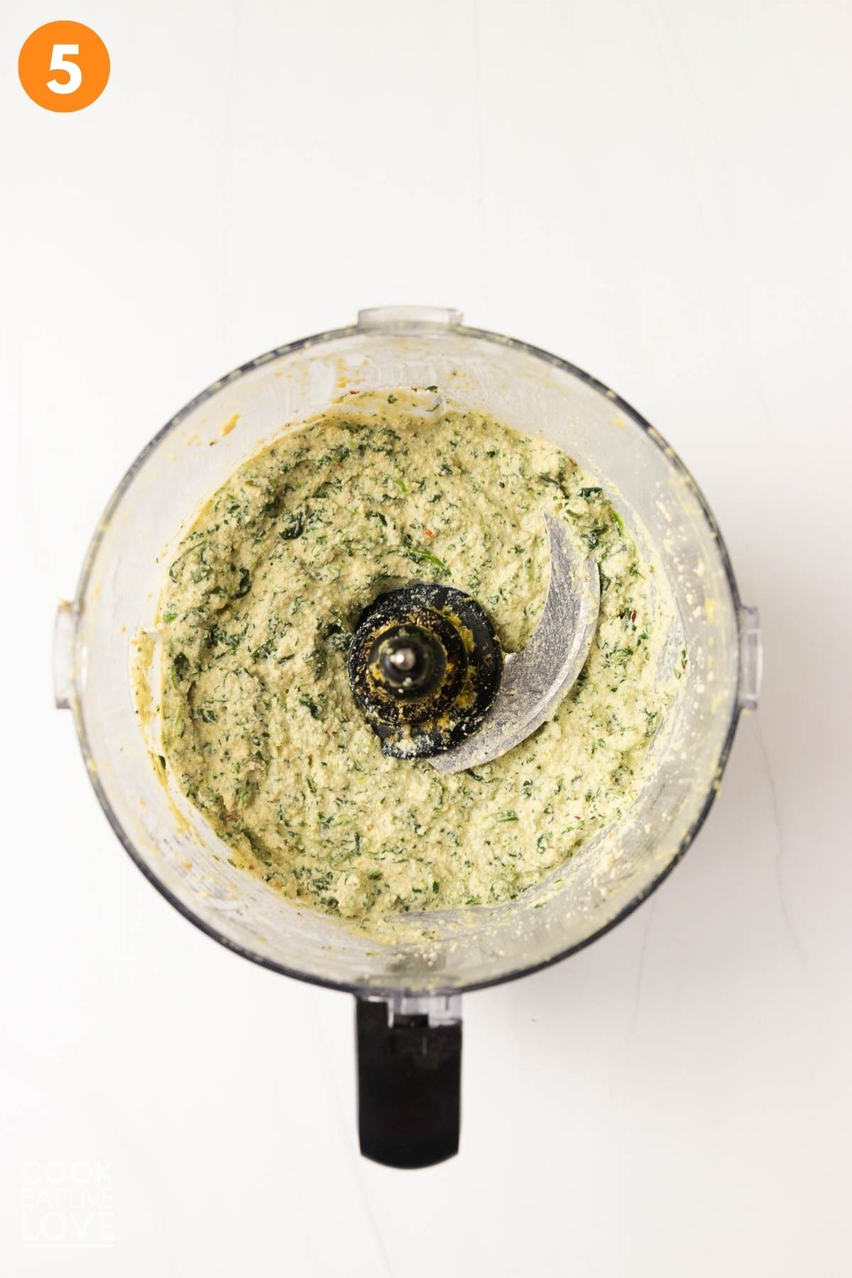 Vegan ricotta with spinach blended in a food processor.