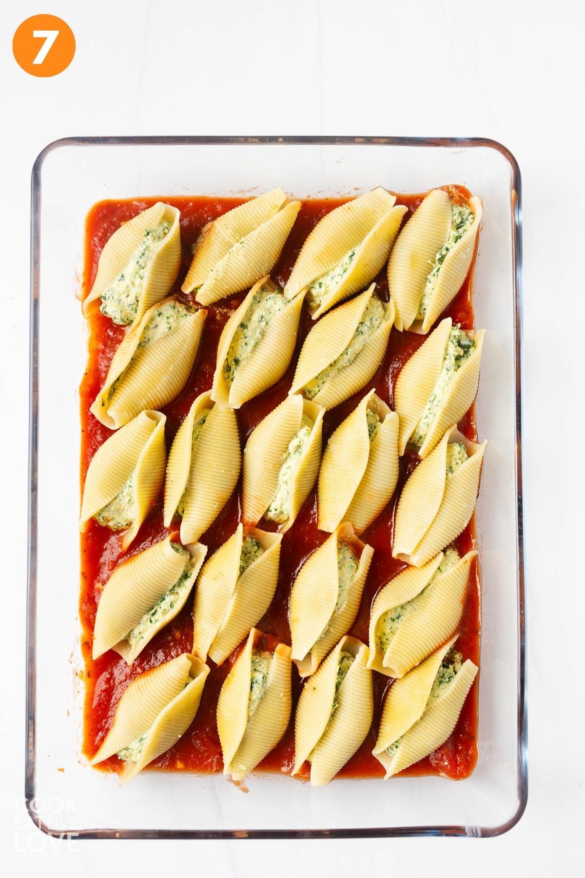 Vegan stuffed shells in the baking dish. 