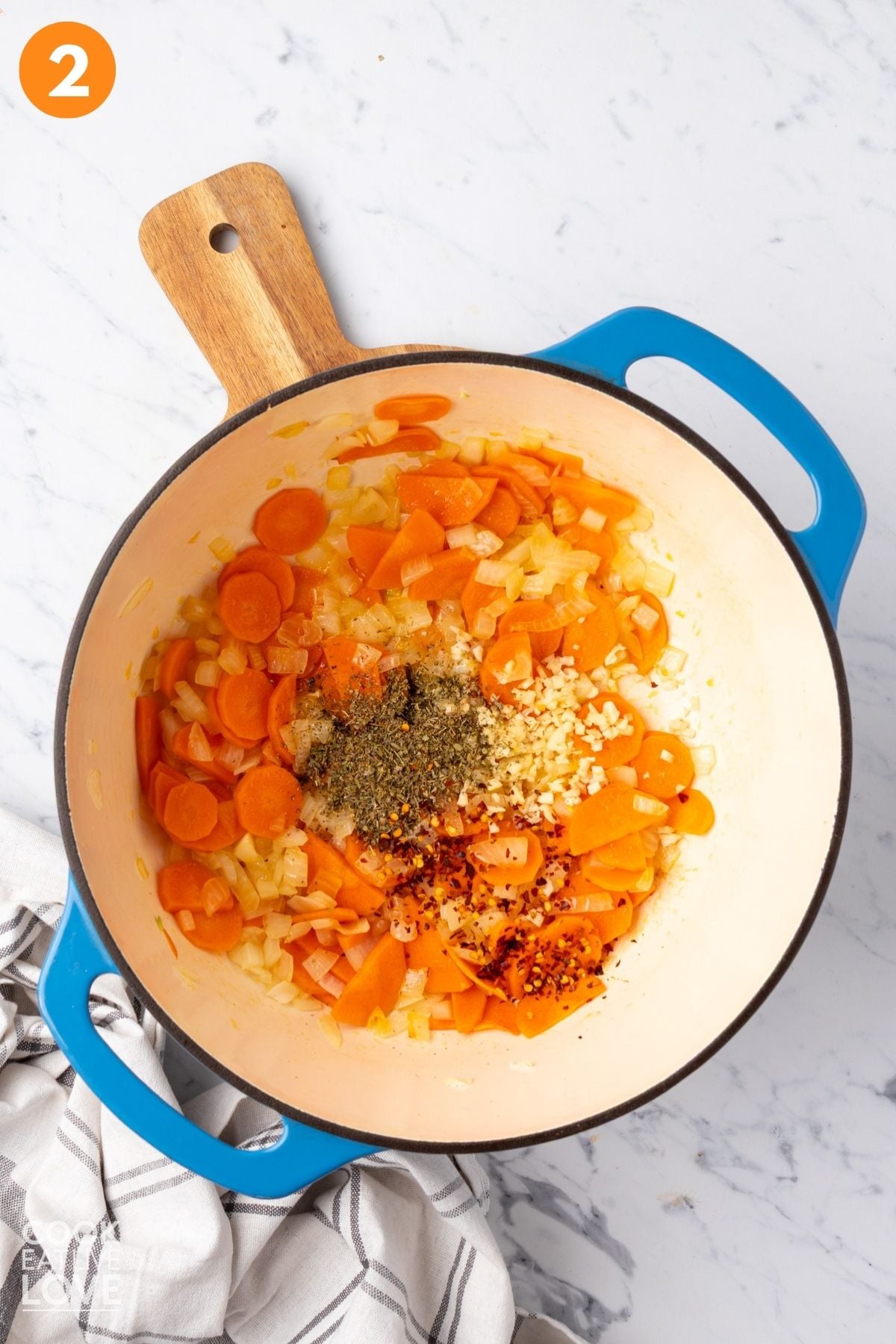 Garlic and seasoning added to the vegetables. 