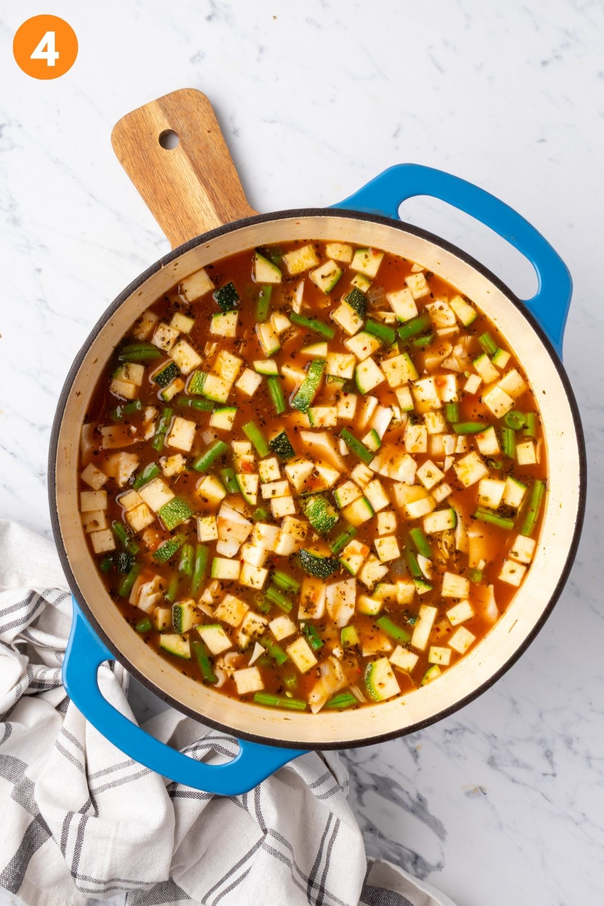 Broth added to make a pot of vegan minestrone soup. 
